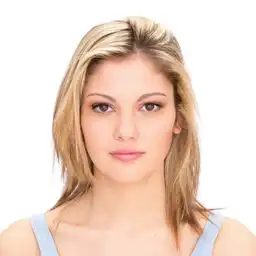 This is a young blonde girl on the face expression changer, and her expression is natural.