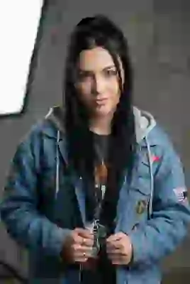 Portrait of a black-haired hippy woman with denim jacket. Template for AI image to image.