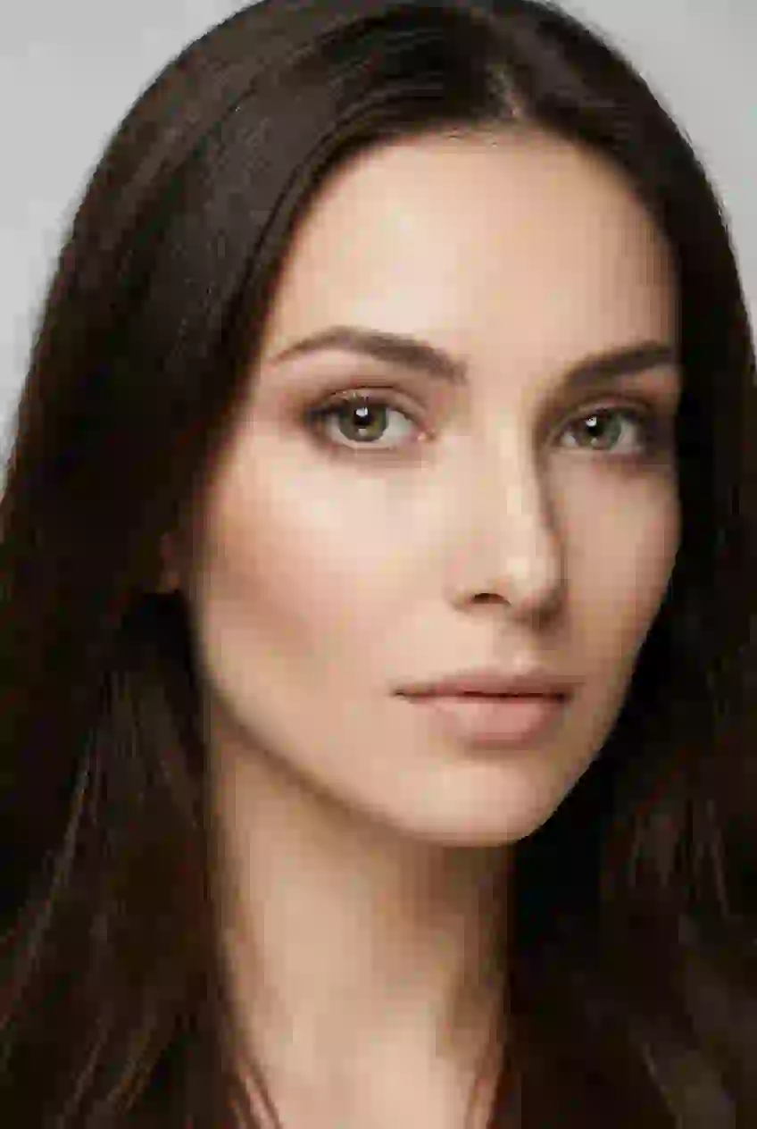 Portrait of a beautiful European woman with dark straight hair and green eyes. Template for AI baby filter.