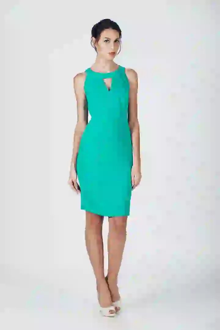 A female model is dressed in a lake blue dress, ready for a clothes swap. Click to change her outfit with the AI clothes changer.